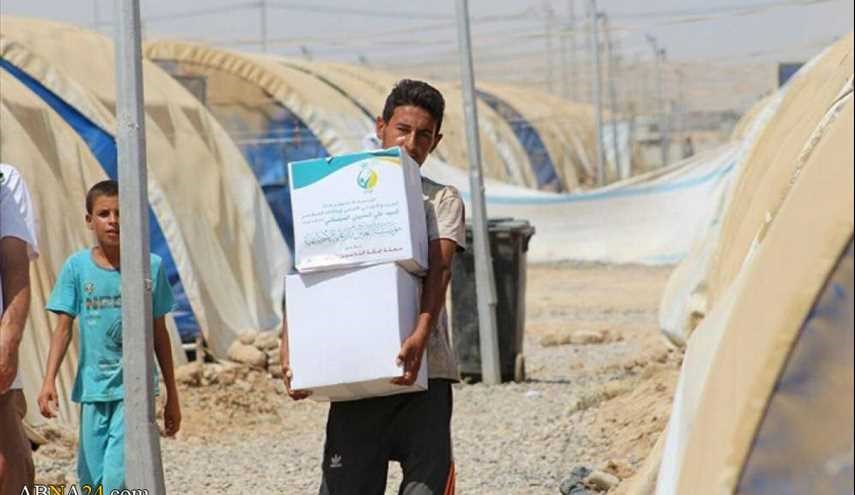 مساعدات انسانية من مكتب المرجع السيستاني للعوائل النازحة من الموصل