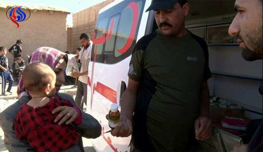 بالصور.. الحشد يستقبل العوائل النازحة مع قرب انطلاق عمليات تلعفر