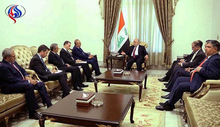 العبادي يؤكد لأوغلو ضرورة الإسراع بسحب القوات التركية من العراق