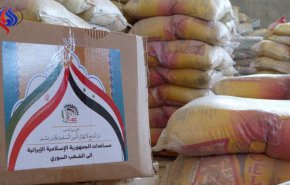 بالصور.. شحنة مساعدات انسانية ايرانية لدير الزور