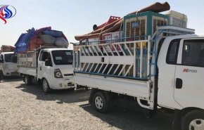 صور: الحشد الشعبي يشرف على عودة 150 عائلة نازحة شمال قضاء بيجي