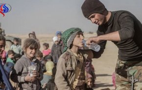 الحشد يستقبل 100 عائلة نازحة من القائم وراوه ويفجر مفخخة