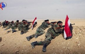 الجيش السوري وحلفاؤه يطوقون البوكمال ويبدأون دخولها