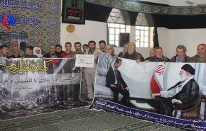 بالصور؛ اهالي نبل والزهراء يواسون ايران بضحايا الزلزال