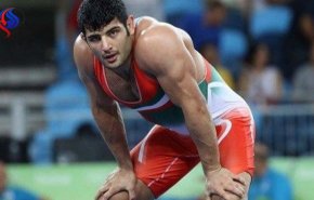 بالصور.. الفلسطينيون يدعمون القرار البطولي للمصارع الإيراني