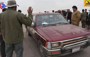 بالصور: الحشد الشعبي يشرف علی عودة النازحين الی الشرقاط