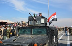 النوري: تفعيل قانون الحشد يجمع الفصائل تحت لواء واحد

