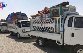 الحشد الشعبي يعيد 465 عائلة نازحة الى قرى بيجي