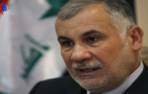 بالصورة: الإنتربول يسلم وزيرا عراقيا هاربا منذ سنوات