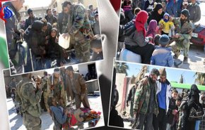 بالصور ..خروج مدنيين من معبر حمورية في الغوطة الشرقية 