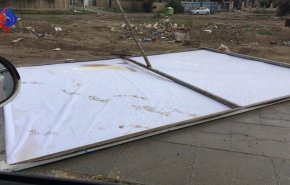 بالصور.. الاطاحة بدعايات مرشحين للانتخابات في بغداد.. والسبب؟!