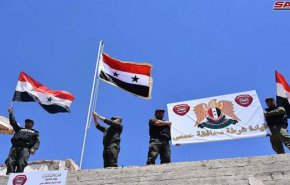 بالصور.. العلم الوطني يرفرف في سماء الرستن وتلبيسة