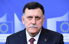 السراج يرفض فكرة إقامة مراكز للمهاجرين في ليبيا
