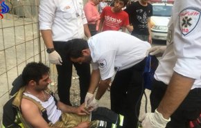 اصابة 24 شخصا في حريق اندلع في برج سكني غرب طهران