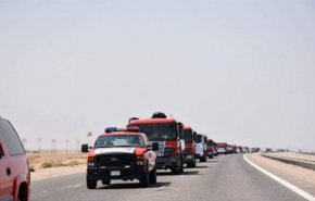 أسطول كبير من عجلات الدفاع المدني يصل الى البصرة + صورة
