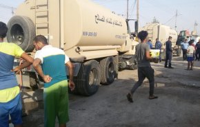 بالصور..الداخلية توصل مياه الشرب لأهالي البصرة