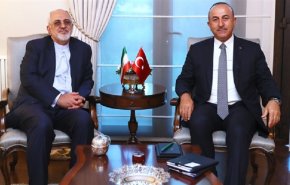 ظريف يبحث مع نظيره الترکي مستجدات المنطقة والشأن السوري