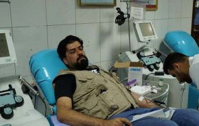 شاهد..هذا ما قامت به الحشد الشعبي حيال المتظاهرين وقوات الأمن