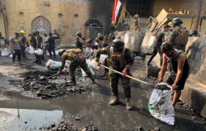 بالصور... الشرطة والشعب في العراق يد واحدة