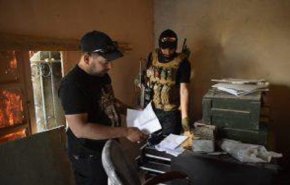 الحشد الانبار يضبط وثائق تخص الودائع المالية لداعش