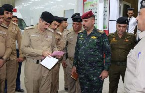 شاهد.. إصابة قائد شرطة النجف الاشرف باحداث المحافظة امس