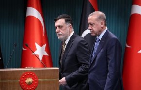 أردوغان معلقا على لحية السراج البيضاء: 