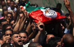 عوائل شهداء دير أبو مشعل تطالب باسترداد جثامين أبنائها
