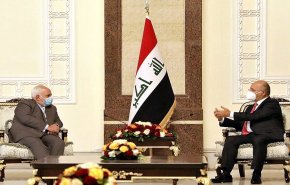 ظريف یلتقی الرئیس العراقي في بغداد
