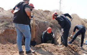 مشاهد مروعة .. العثور على مقبرة جماعية ضحايا الإرهاب الداعشي!