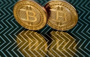 البيتكوين يسجل رقما قياسيا جديدا ويصل ل60 الف دولار