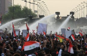مواجهات بين متظاهرين وقوات الامن العراقية في بغداد 