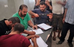 استمرار تسليم السلاح وتسوية أوضاع المسلحين من درعا البلد