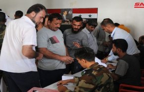  تسوية أوضاع عدد من المسلحين والمطلوبين في مدينة جاسم السوریة  