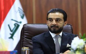 الحلبوسي يدلي بصوته في أحد مركز الاقتراع بالانبار (صورة)