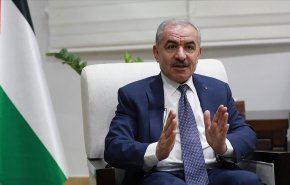 اشتية يحمل 