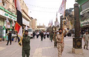 بالصور.. الحشد الشعبي يزف احد شهدائه بالنجف الاشرف