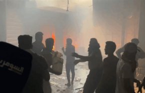 اندلاع حريق ضخم داخل سوق في بغداد