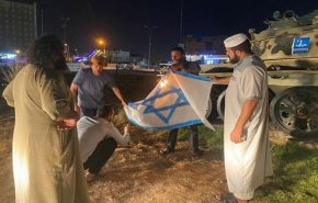 ليبيا.. تنديد سياسي وإحراق للعلم 