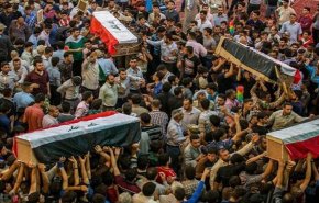 غضب عارم ضد امريكا خلال تشييع شهداء الحشد الشعبي 
