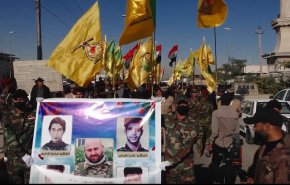 الحشد الشعبي يشيع شهدائه ارتقوا بقصف امريكي غادر