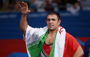 بطل المصارعة الإيراني 
