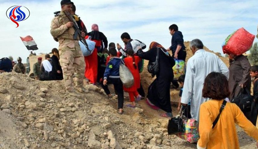 اجلاء 300 عائلة من القائم عبر ممرات مؤمنة من الحشد الشعبي

