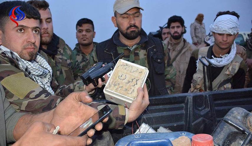 الحشد الشعبي يعثر على انفاق وسيارة محملة بالعتاد جنوب غرب كركوك+صور