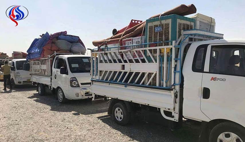 الحشد الشعبي يعيد 465 عائلة نازحة الى قرى بيجي