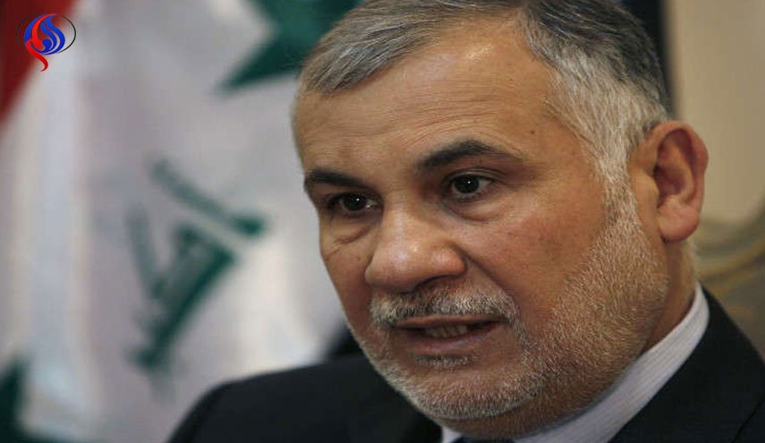 بالصورة: الإنتربول يسلم وزيرا عراقيا هاربا منذ سنوات