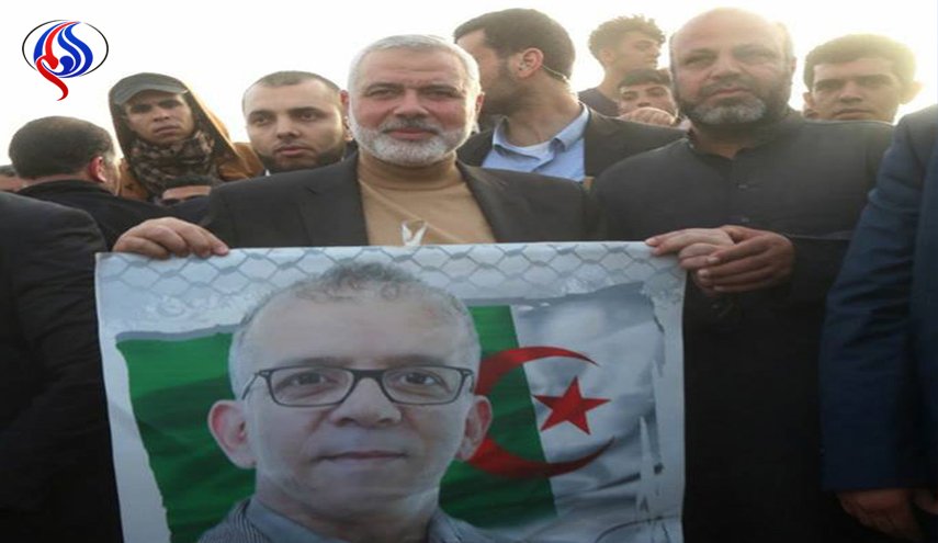 لماذا رفع إسماعيل هنية صورة حفيظ دراجي؟ + صور