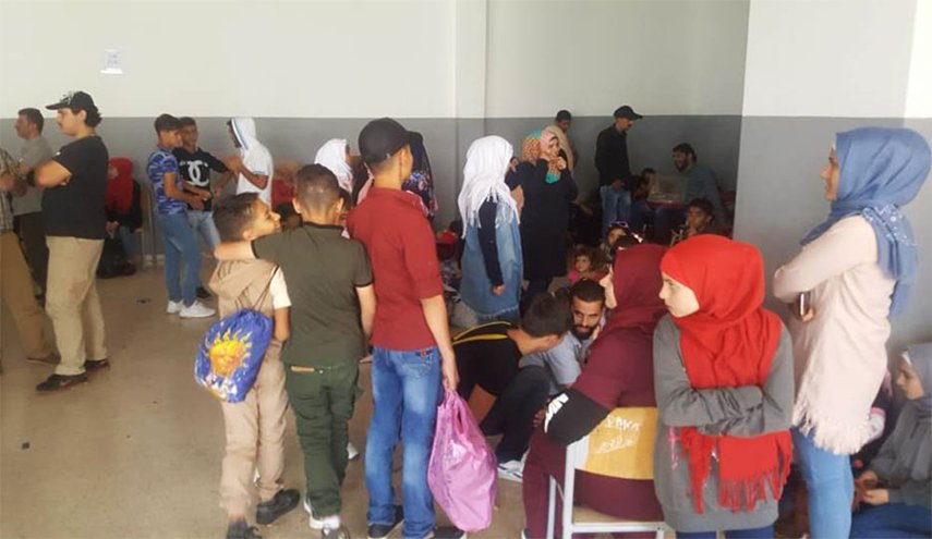 بالصور...عودة مئات النازحين السوريين من لبنان