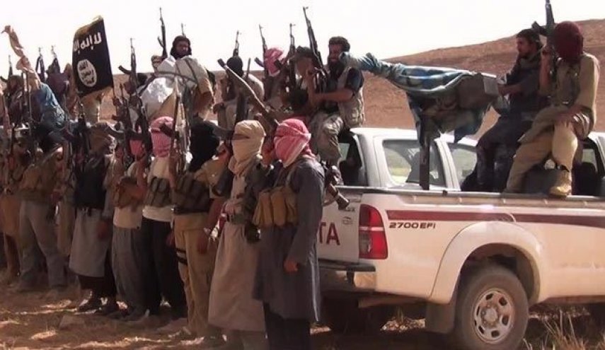 شاهد..قيادي داعشي متنكر بزي نسائي في قبضة الامن  