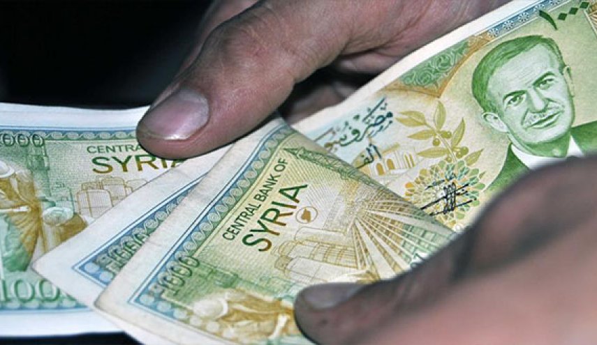تجار سوريا .. تبديل 100 دولار بسعر الصرف الرسمي