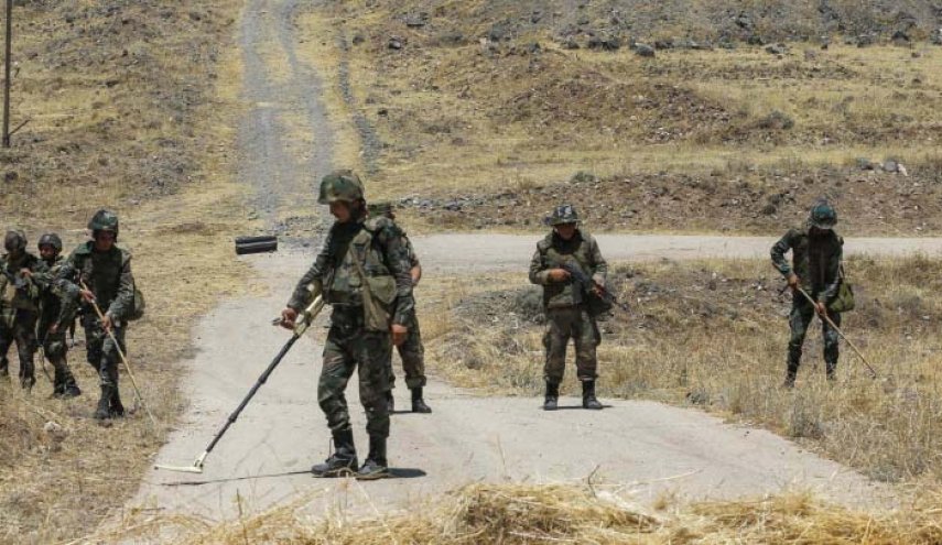 مسح 24 قرية وبلدة وتفجير 163 طنا في الغوطة الشرقية